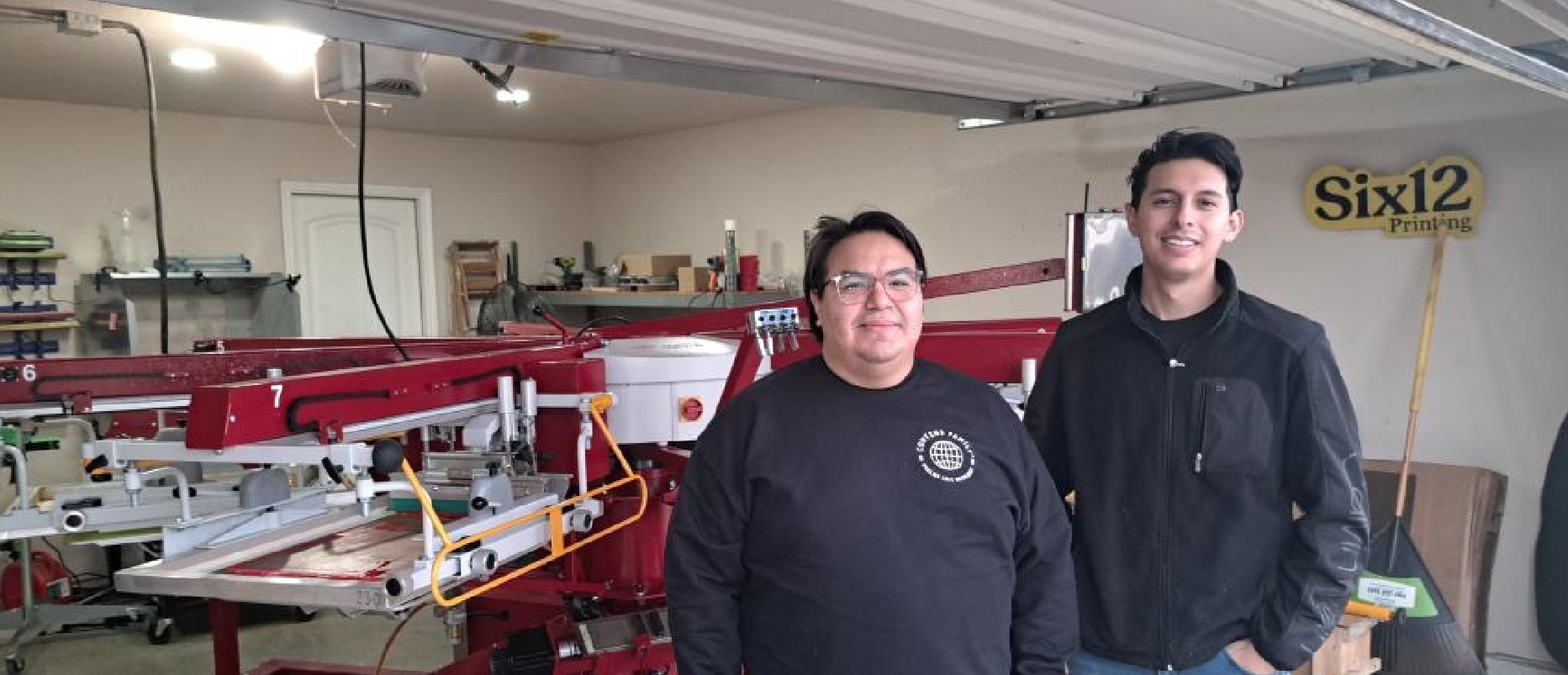 Jon and Joe screen printing in their Dallas garage for Six12 Printing.
